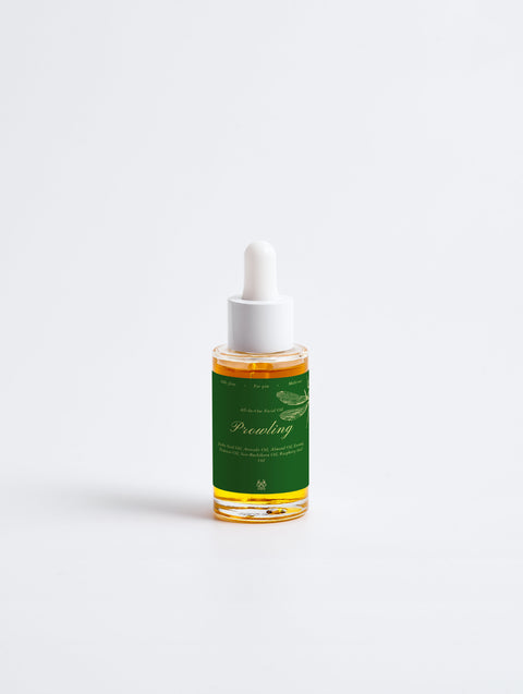 All-in-One Facial Oil bottle with premium packaging featuring a nourishing botanical oil blend