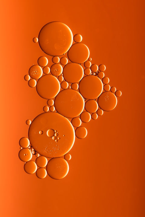 Front view of All-in-One Facial Oil packaging highlighting a hydrating facial oil formula